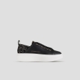 Wembley Woman in black leather with studs on the heel