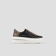 Lancaster Woman in black leather and striped laminated copper heel