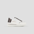 Lancaster Woman in white leather and spotted laminated bronze heel