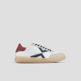 Ocean Uomo in bianco e dettagli suede grigio con logo laterale blu e tallone rosso